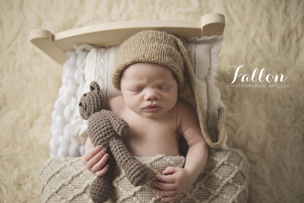 BABY IN BED NEWBORN