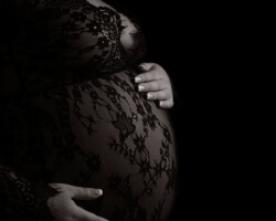 expecting mother wearing black dress maternity session pawtucket, ri by Fallon Photographic Art