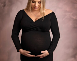 Expecting mother in black dress during studio maternity session Pawtucket, RI by Fallon Photographic Art