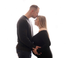 Expecting mother in black dress during studio maternity session Pawtucket, RI by Fallon Photographic Art